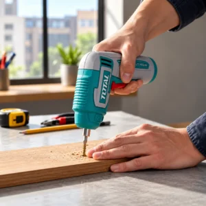 TOTAL 4V Cordless Screwdriver with USB Type-C Charging, Teal and White Body, Red Trigger and Metal Bit Holder toolstationpakistan, toolstation.com