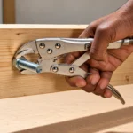 Total Tools locking pliers with serrated jaws and adjustable locking mechanism on white backgroundtoolstationpakistan, toolstation.com