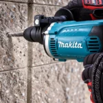HP1630 electric impact drill with 16mm keyed chuck, twist drill bit, T-handle chuck key and auxiliary side handletoolstationpakistan, toolstation.com