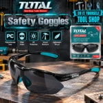 TOTAL safety welding goggles worn by a worker during metal cutting and welding work with flying sparkstoolstationpakistan, toolstation.com