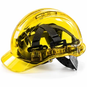 Yellow safety hard hats stacked on a wooden table at a construction workplacetoolstationpakistan, toolstation.com