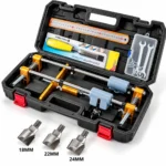Adjustable gold alloy door mortising and drilling jig mounted on a wooden door with steel guide rods, clamps and cutter bits. toolstationpakistan, toolstation.com